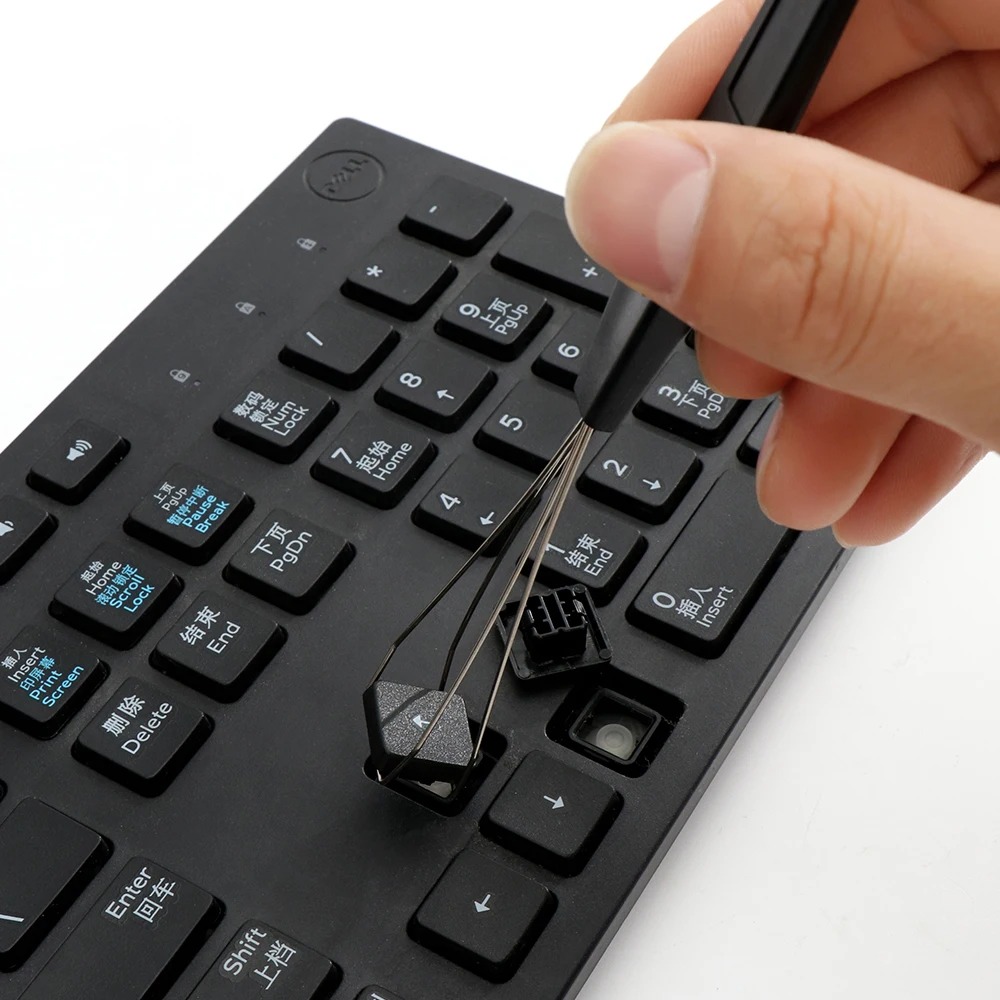 Extracteur de capuchons de tou - Keycap Puller Ring avis et prix